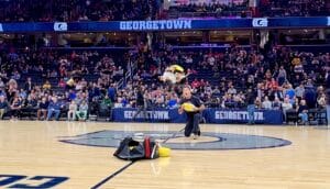 John Misita performs on the Georgetown basketball court